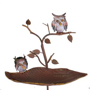 Vogelbadje met twee Uilen